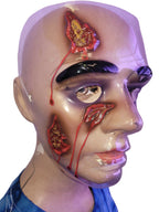 Plastic Wounded Face Bloody Masks by HalloweenStore.com