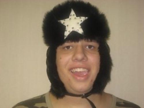 Winter Black Bomber Hat with Black Fur and White Star by HalloweenStore.com