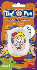 Glow in the Dark Monster Vampire Fangs Teeth by HalloweenStore.com