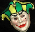 Harlequin Jester Mardi Gras Plastic Face Mask by HalloweenStore.com