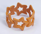 Star Bangle Bracelet Orange Club Candy Neon Colored Plastic by HalloweenStore.com