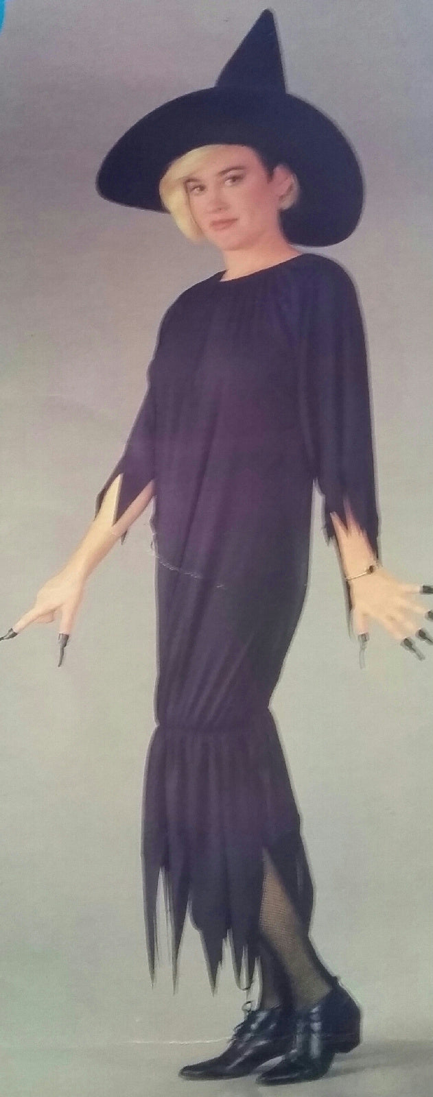 RG Costumes Witch Adult Costume Tattered Black Gown Dress by HalloweenStore.com