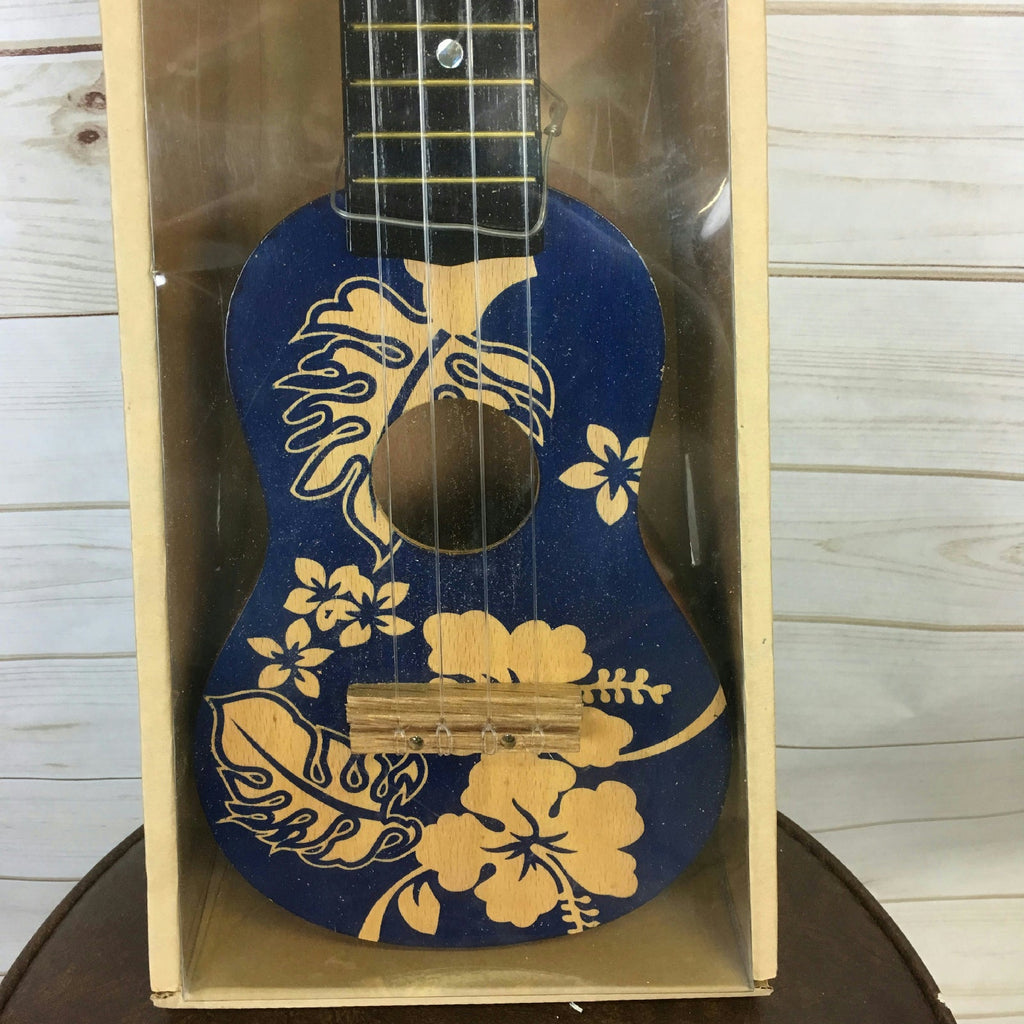 18" Wooden Ukulele Blue Floral Hawaiian Print Tropical Party Accessory by HalloweenStore.com