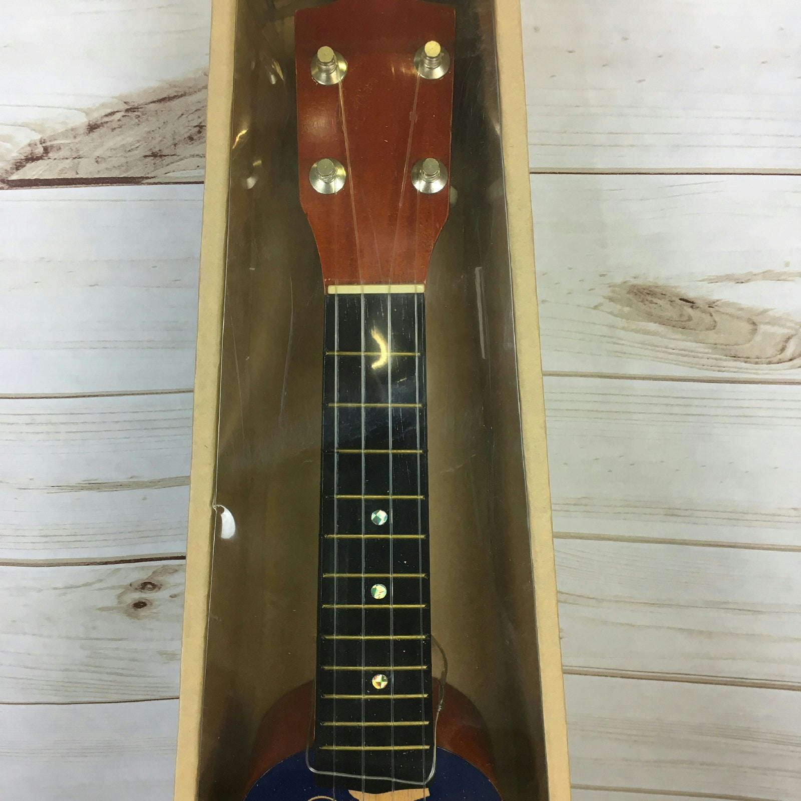 18" Wooden Ukulele Blue Floral Hawaiian Print Tropical Party Accessory by HalloweenStore.com