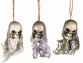 3 Bloody Hanging Skulls with Mesh Netting Hoods by HalloweenStore.com