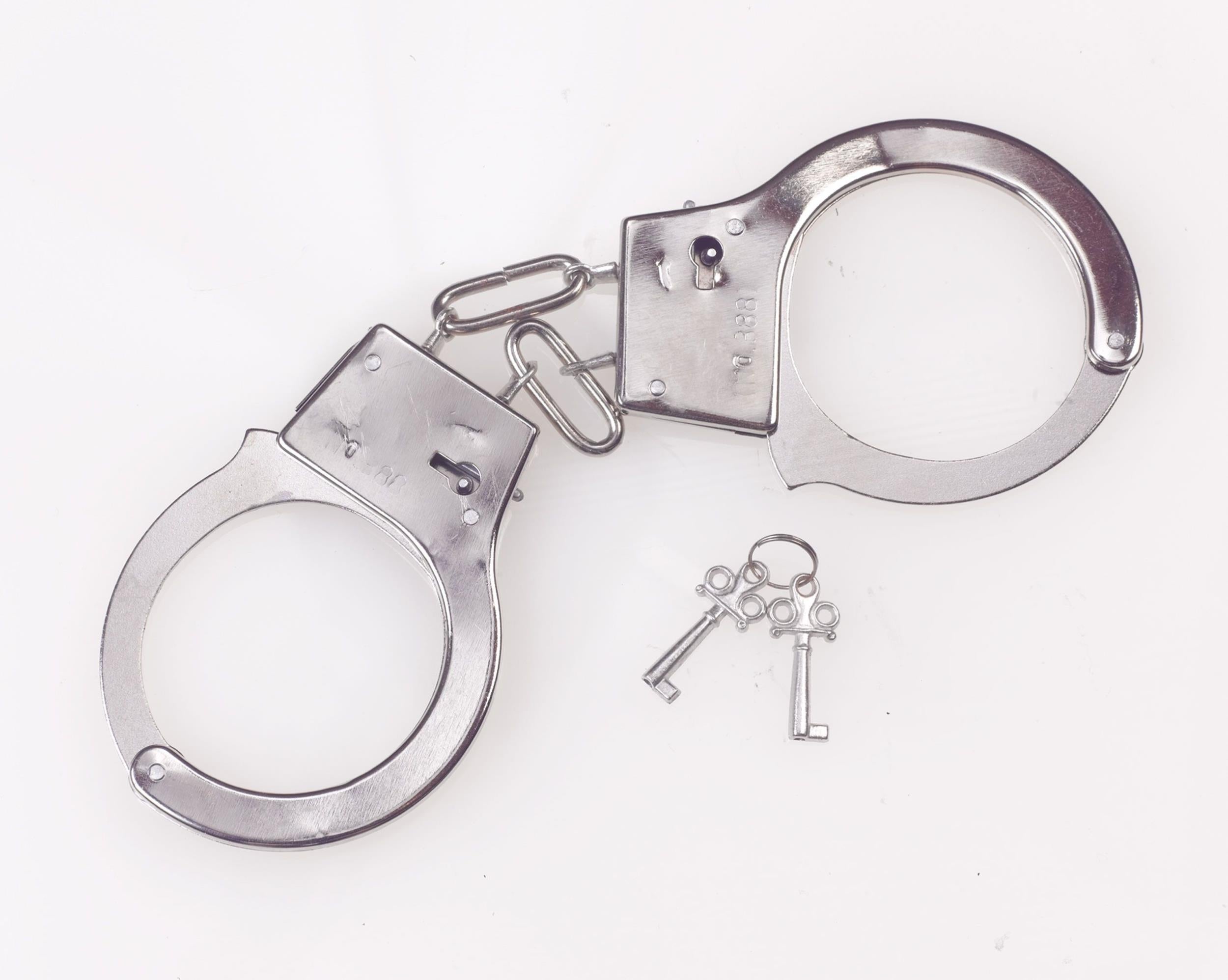 Metal Handcuffs Fake Costume Accessory with Keys by HalloweenStore.com