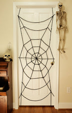7 Foot Black Spiderweb Door Rope Halloween Decoration by HalloweenStore.com
