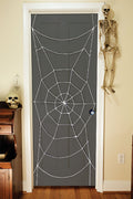 7 Foot Black Spiderweb Door Rope Halloween Decoration by HalloweenStore.com