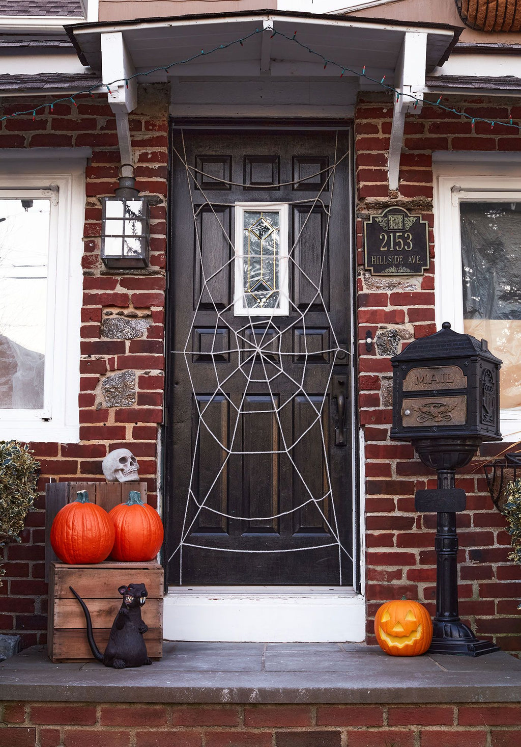 7 Foot Black Spiderweb Door Rope Halloween Decoration by HalloweenStore.com