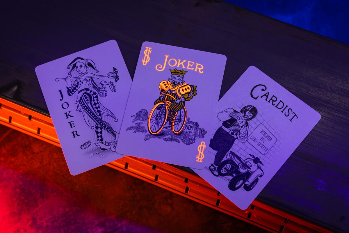 Bicycle Neon Rider Back Solar-Orange Deck Playing Cards by Card-Addiction.com