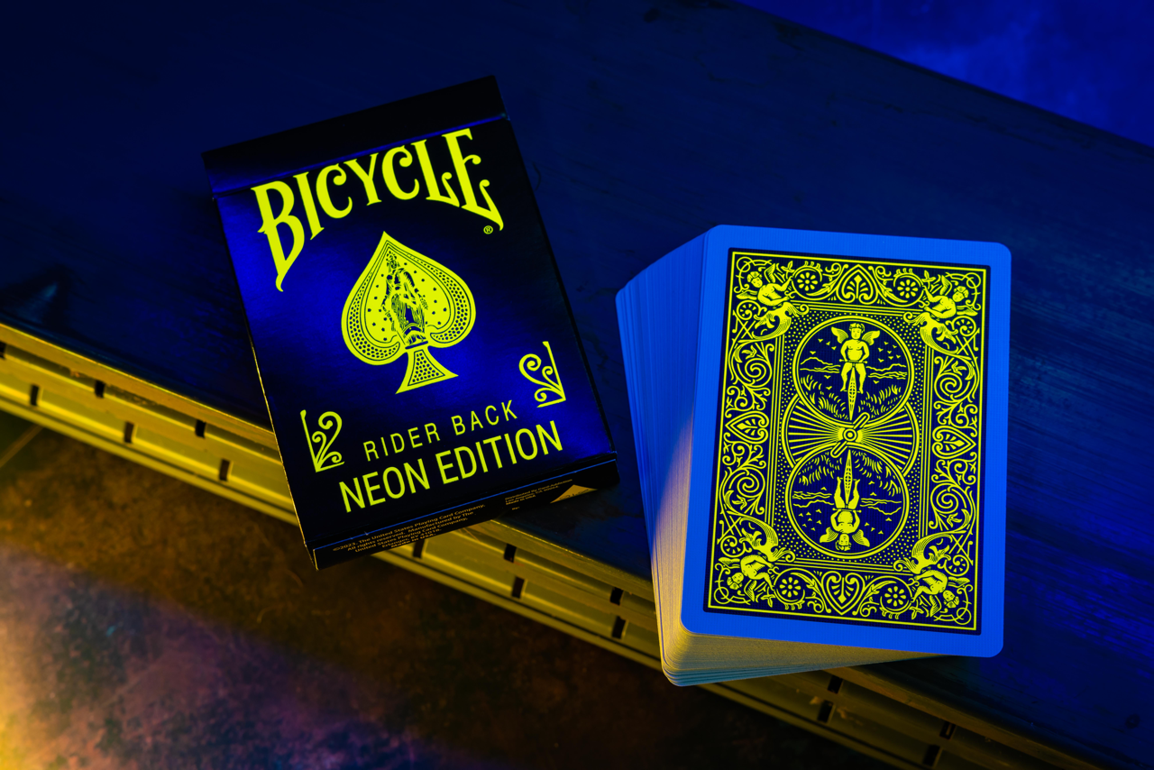Bicycle Neon Rider Back Yellow-Starburst Deck Playing Cards by Card-Addiction.com