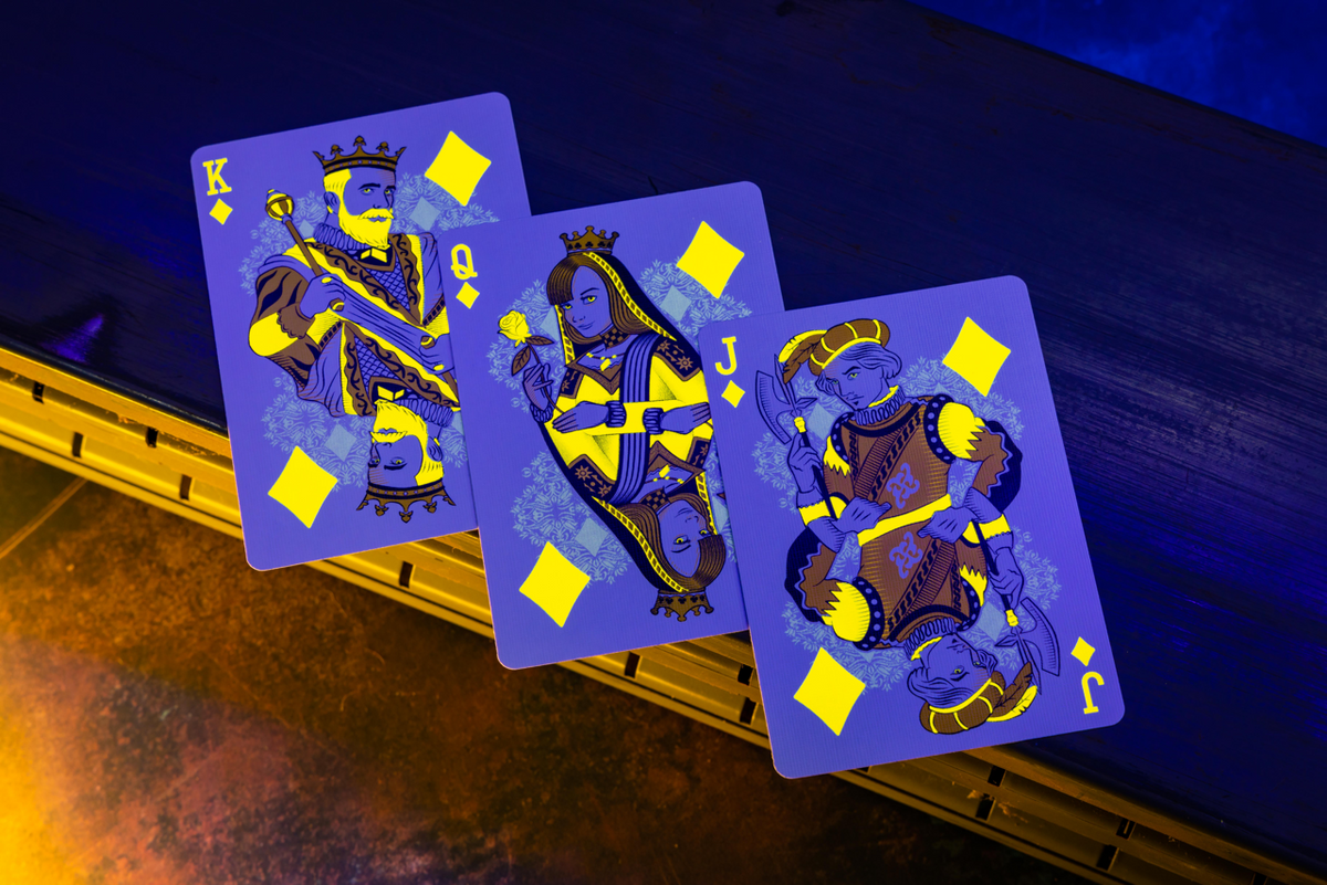 Bicycle Neon Rider Back Yellow-Starburst Deck Playing Cards by Card-Addiction.com
