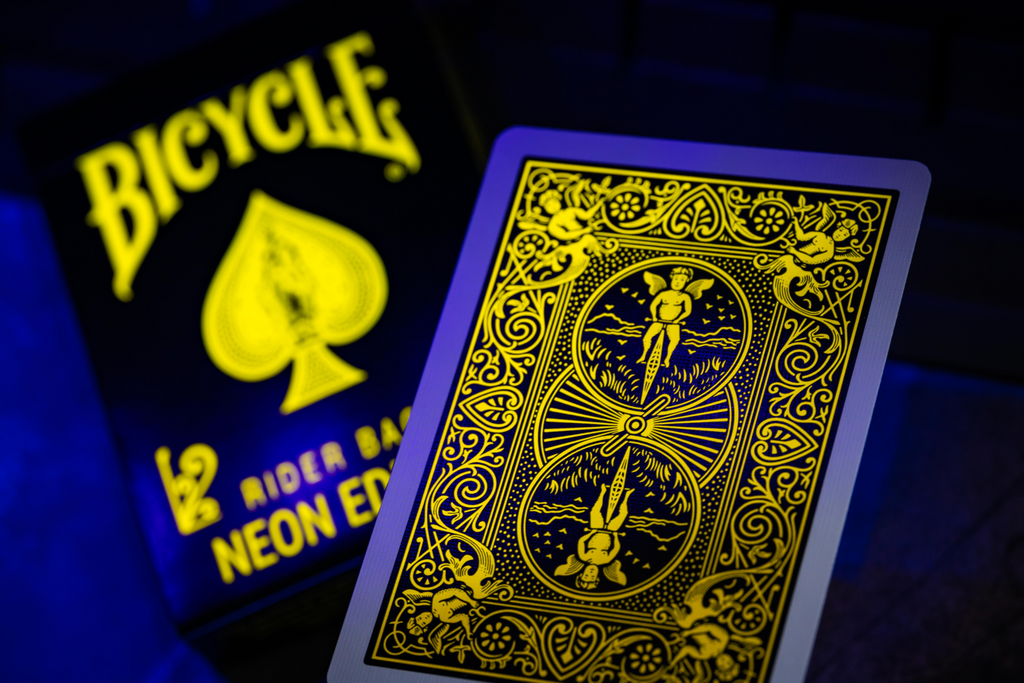 Bicycle Neon Rider Back Yellow-Starburst Deck Playing Cards by Card-Addiction.com