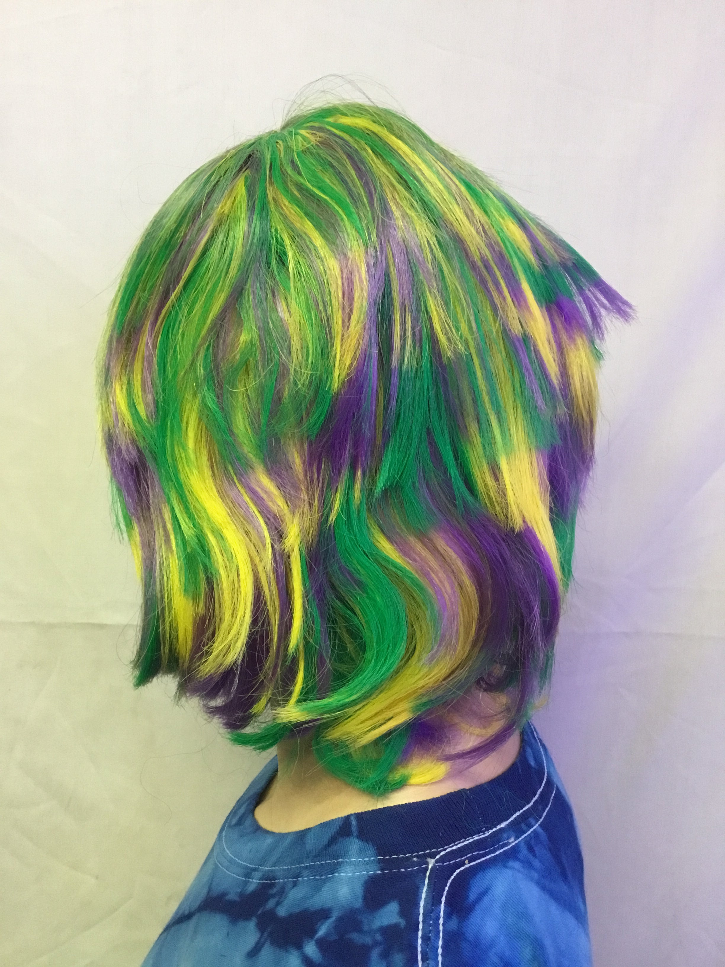 Mardi Gras Choppy Yellow Green Purple Layered Fat Tuesday Party Wig by HalloweenStore.com
