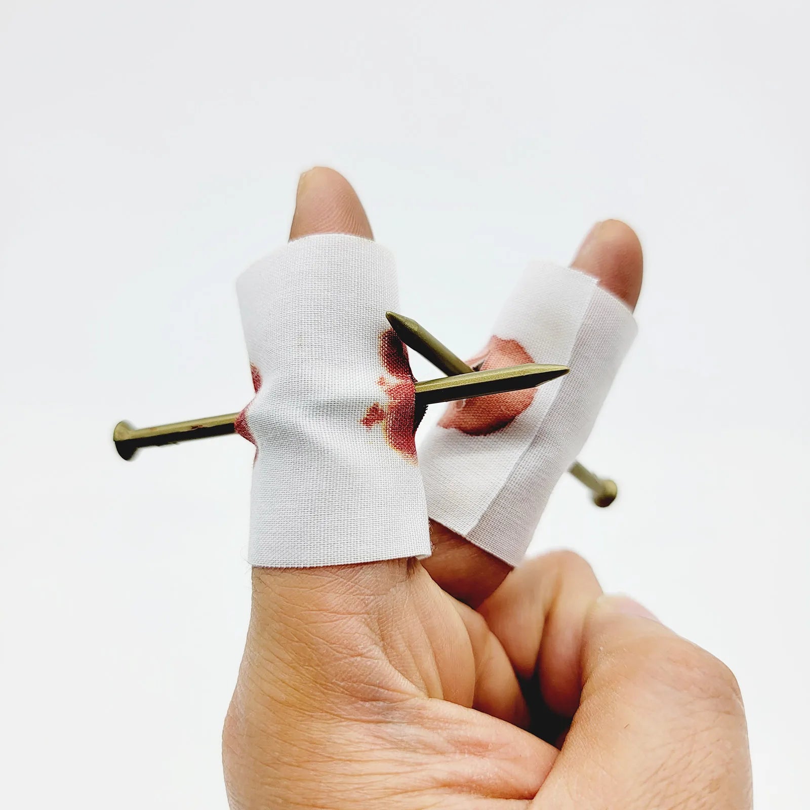 Fake Nail Through Finger Prank Props – Horror Gag Set (5 Pieces) - Big Tim's Magic Emporium