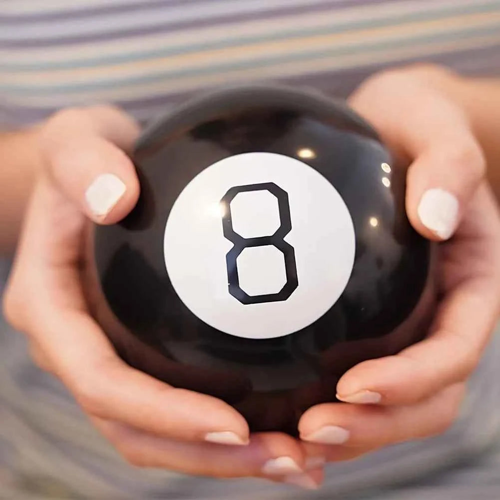 Magic 8 Ball - A mysterious answer ball with a glossy black exterior and white number 8 interior - Party prediction game