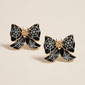 Halloween Spider Web Bow Stud Earrings by Madeline Love