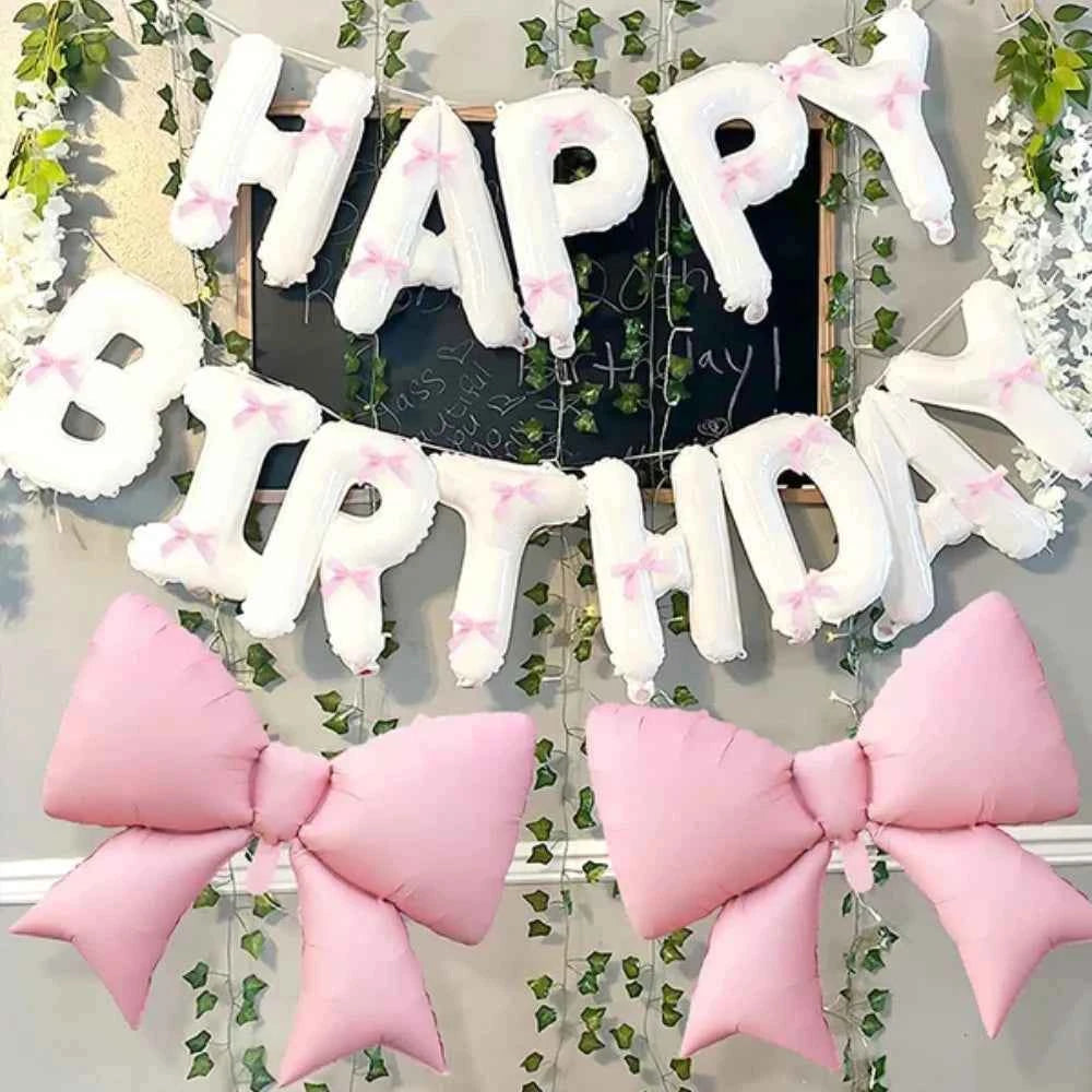 White Happy Birthday banner balloon and light pink bow balloon with pink ribbon bow, birthday party decoration