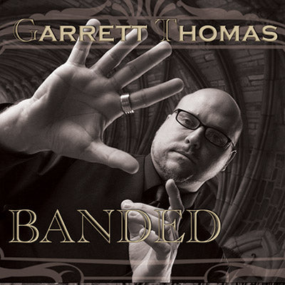 Banded 25 mm by Garrett Thomas and Kozmomagic by Murphy's Magic Supplies, Inc.
