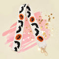 Halloween Bat Pumpkin Seed Beaded Bag Strap by Madeline Love