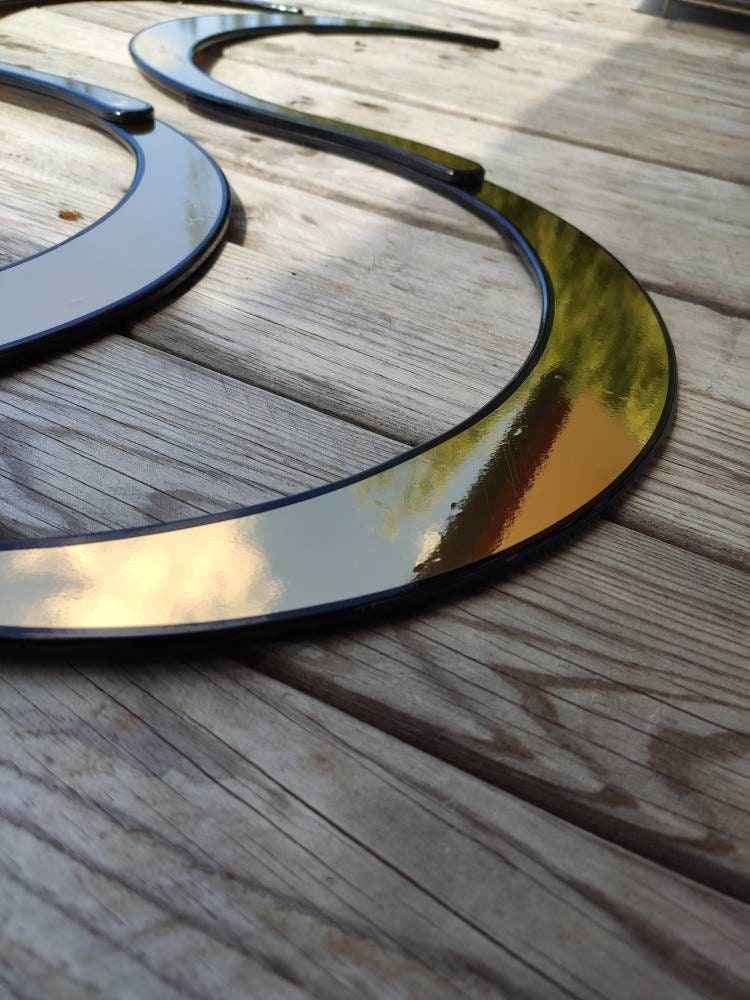Buugeng Metalic gold.chose your shape and material .flow toy.round edges. By snakejuggling