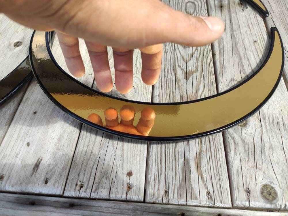 Buugeng Metalic gold.chose your shape and material .flow toy.round edges. By snakejuggling