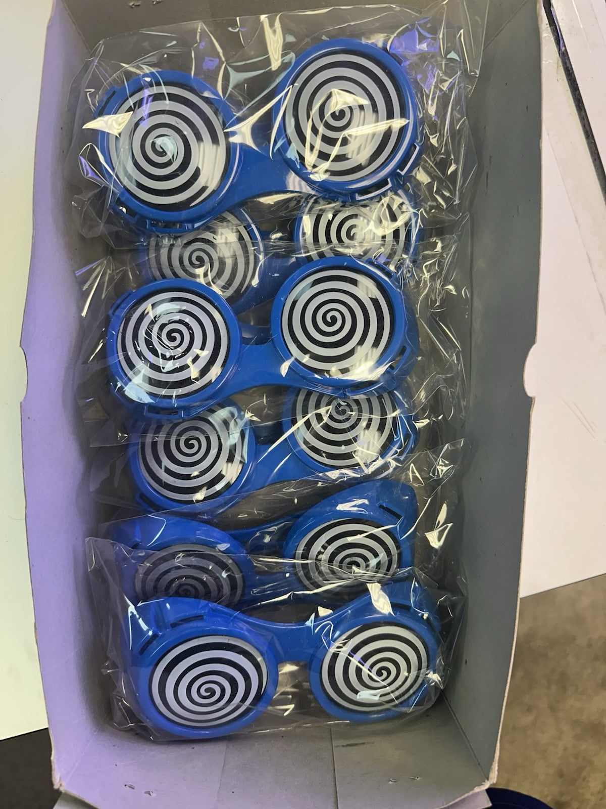 Blue X-Ray Hypnotizing Sunglasses with Swirl Lens by HalloweenStore.com